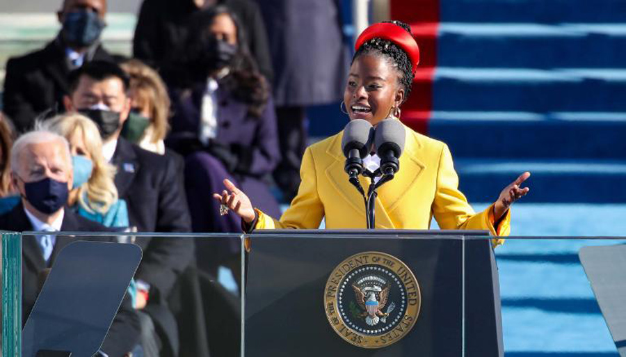 Young Black poet Amanda Gorman delivers a poem at Joe Biden inauguration