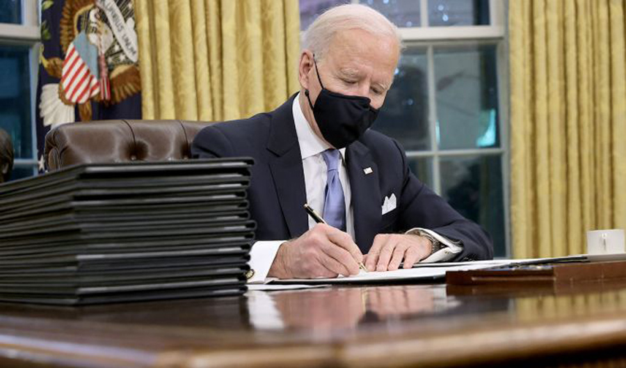 Biden signs order to end Trump's Muslim travel ban
