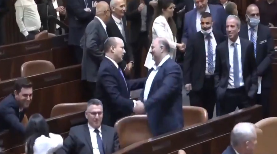 Ikhwanul Muslimin leader Mansoor Abbas handshakes Israel's new PM
