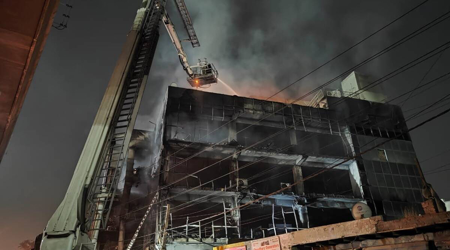 At least 27 dead after massive fire breaks out in building in Delhi's Mundka