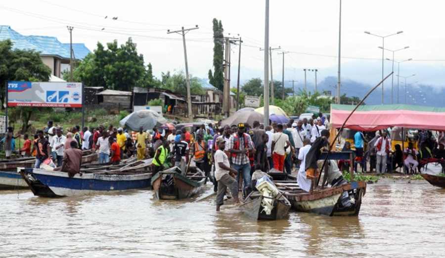 Mass drowning horror as 76 people die when boat capsizes in swollen river after record floods in Nigeria