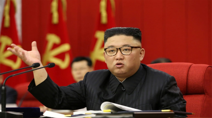 North Korea's Kim vows to respond to nuclear threats, oversees missile test