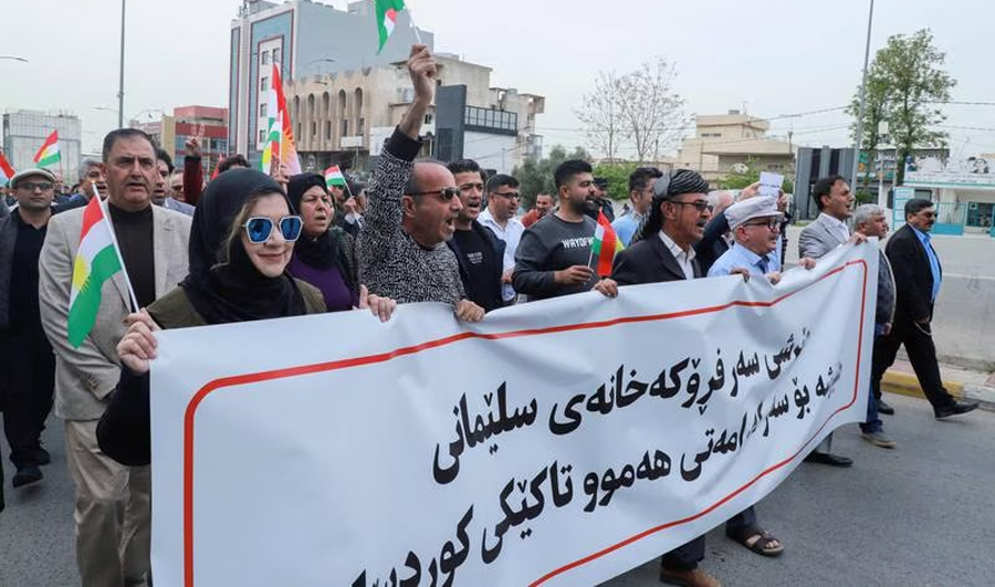 Iraqi Kurds protest against Turkish bombardments after airport explosion