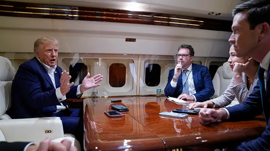 Trump kicks NBC reporter off plane, slams network as 'fake news:' 'Get him out of here'